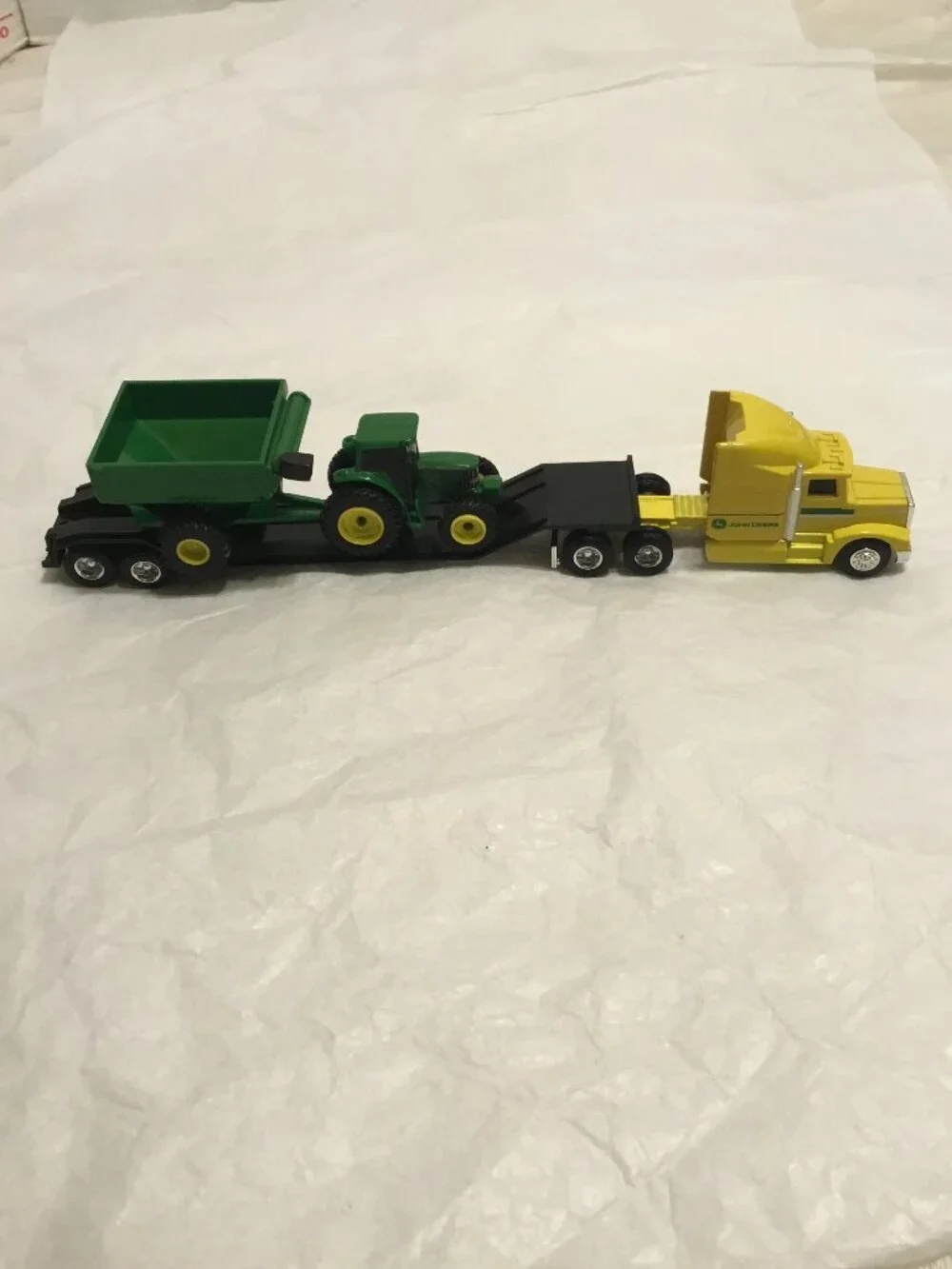 Vintage die cast John Deere tractor trailer and trailer w/ tractor and grain bin